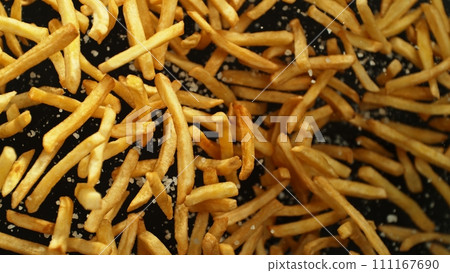 Flying French Fries up in the Air. Fast Food Concept with Flying Food. 111167690