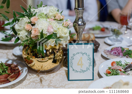 food at a wedding party in a restaurant with decor food at a wedding party in a restaurant with decor 111168660