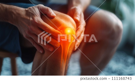 Man sitting down with knee pain Man sitting down with knee pain 111168743