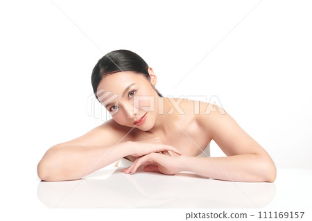 Beautiful young asian woman with clean fresh skin on white background, Face care, Facial treatment, Cosmetology, beauty and spa, Asian women portrait. Beautiful young asian woman with clean fresh skin on white background, Face care, Facial treatment, Cosmetology, beauty and spa, Asian women portrait. 111169157