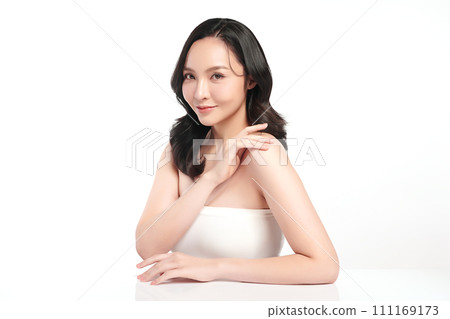 Beautiful young asian woman with clean fresh skin on white background, Face care, Facial treatment, Cosmetology, beauty and spa, Asian women portrait. Beautiful young asian woman with clean fresh skin on white background, Face care, Facial treatment, Cosmetology, beauty and spa, Asian women portrait. 111169173