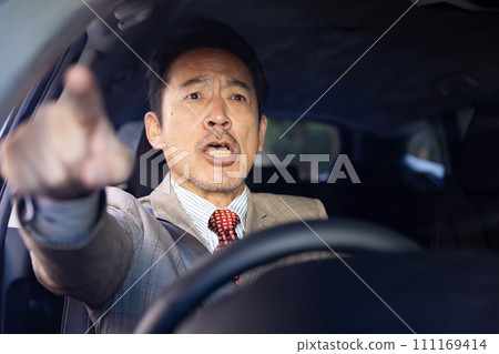 Angry male driver Angry male driver 111169414