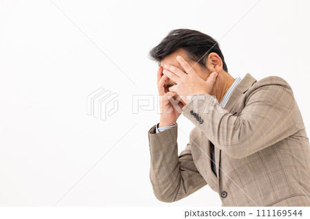 Businessman laments close-up Businessman laments close-up 111169544
