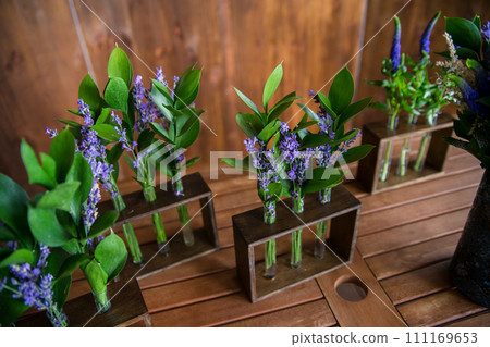 decor of flowers on a table in a restaurant decor of flowers on a table in a restaurant 111169653