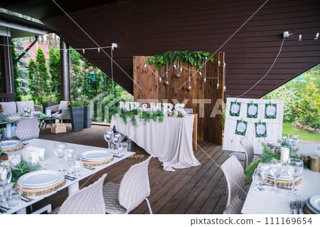 decor of flowers on a table in a restaurant 111169654