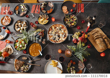 Top view of brunch table with tasty delicious food and beverages ready for holiday home dinner 111170018