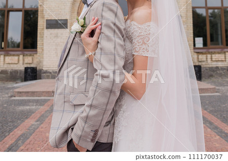 bride and groom in summer park together bride and groom in summer park together 111170037