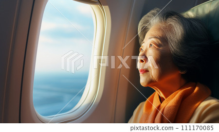 Asian elderly woman boarding a plane 111170085
