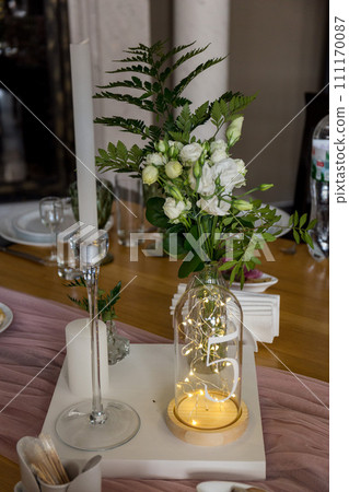 wedding table with decor in a restaurant 111170087