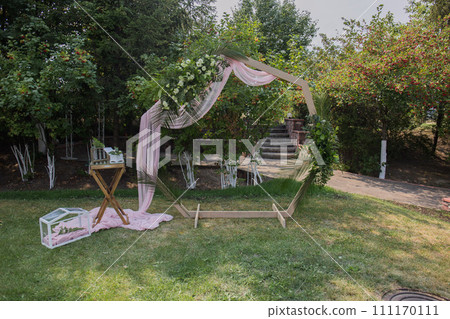decor of arches and chairs for the wedding ceremony 111170111