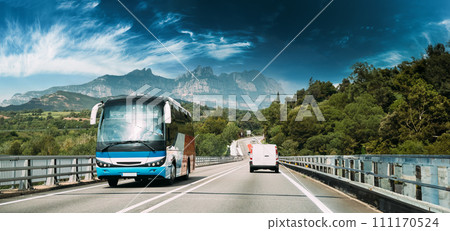 Spain. Touristic Bus Car Goes On Motorway Freeway Highway Road On Background Of Spanish Montserrat Mountain Nature Landscape 111170524