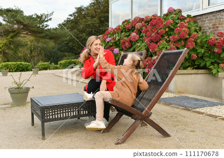 Mother and daughter spending time together in a cafe Mother and daughter spending time together in a cafe 111170678