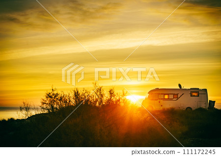 Caravan on sea at sunrise. Caravan on sea at sunrise. 111172245