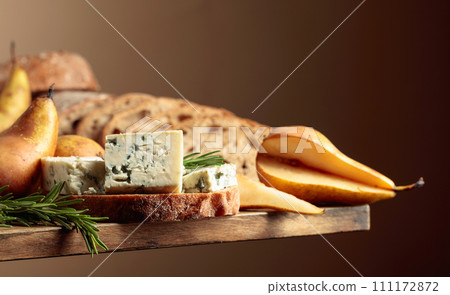 Sandwich with blue cheese, pears, and rosemary. Sandwich with blue cheese, pears, and rosemary. 111172872