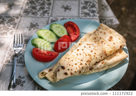 Traditional turkish savory pastry Gozleme served outdoor 111172922