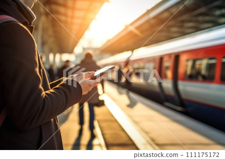 Close up Hand of human using mobile phone at railway station Generative AI 111175172
