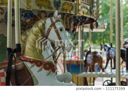 children's carousel in the park 111175399