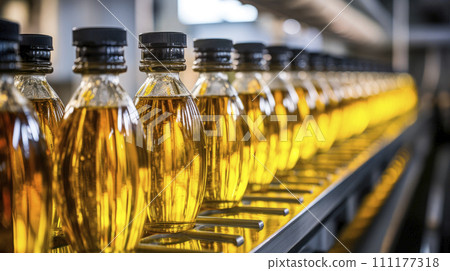 Oil in bottles. Industrial production of vegetable oil. Conveyor line for bottling and packing. 111177318