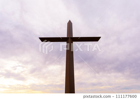 Brown Metal Cross, Yellow Purple Sky on Background. Religion, Christian Holiday, Good Friday, Easter day. Christian backdrop. Biblical faith, Gospel, Salvation Concept. Jesus Christ Crucifixion. 111177600