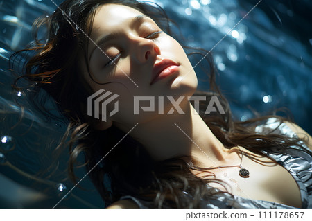 Beautiful woman is in a clear and clean blue swimming pool. She closed her eyes and relaxed. The sun shines on her She is enjoying the summer vacation. This image represents happiness and relaxation. Beautiful woman is in a clear and clean blue swimming pool. She closed her eyes and relaxed. The sun shines on her She is enjoying the summer vacation. This image represents happiness and relaxation. 111178657