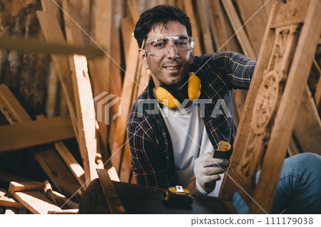 portrait professional carpenter man hand working make wooden handcraft furniture master workpiece fine detail artisan with wood workshop. 111179038