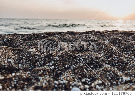 sea waves on the shore.sand and pebble beach. relaxation on the beach by the sea. Mediterranean Sea. vacation in turkey sea waves on the shore.sand and pebble beach. relaxation on the beach by the sea. Mediterranean Sea. vacation in turkey 111179703