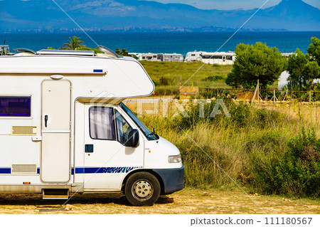 Caravans on sea coast, Spain 111180567