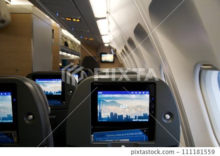 COPENHAGEN, DENMARK - NOV 24, 2018: Aircraft cabin in Economy Class on a long-haul flight to San Francisco 111181559