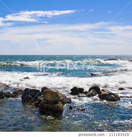 tropical beach and sky with beautiful clouds. 111183329