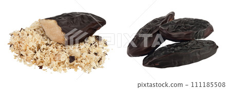 Tonka bean isolated on white background with full depth of field. Bean of Dipteryx odorata 111185508