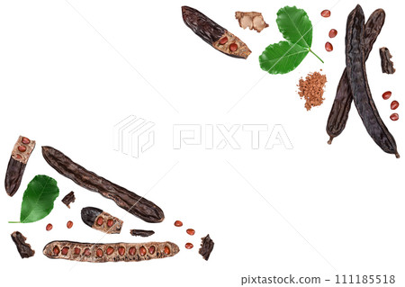 Ripe carob pods and bean isolated on white background . Top view with copy space for your text. Flat lay 111185518