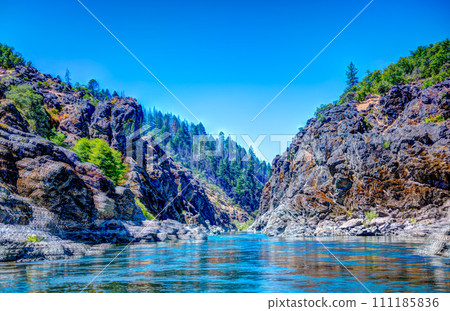 defocused Water level view of Hellgate Canyon on the wild and scenic Rogue River defocused Water level view of Hellgate Canyon on the wild and scenic Rogue River 111185836