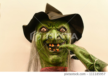 Head of a green monster with bulging eyes Halloween Head of a green monster with bulging eyes Halloween 111185957