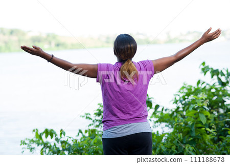 Young woman freedom standing outside. Young woman freedom standing outside. 111188678
