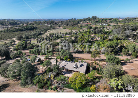 Aerial view over Rancho Santa Fe green valley landscape in San Diego 111188890