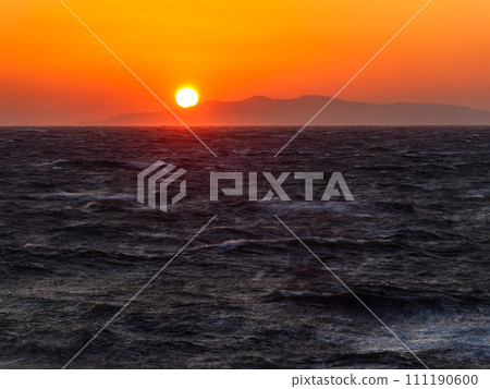 Dynamic sunset view of the Pacific Ocean seen from Nojimazaki with strong winds and rough waves Dynamic sunset view of the Pacific Ocean seen from Nojimazaki with strong winds and rough waves 111190600