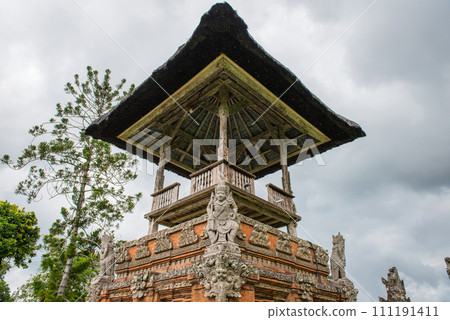The spiritual shrine in Pura Taman Ayun the royal temple of Mengwi empire in Badung Regency, Bali, Indonesia. View in the Cloudy day. The spiritual shrine in Pura Taman Ayun the royal temple of Mengwi empire in Badung Regency, Bali, Indonesia. View in the Cloudy day. 111191411