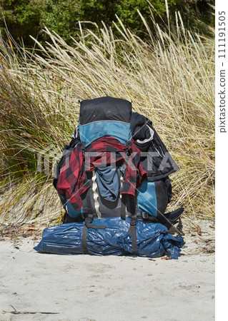 Big backpack on the ground, traveling around the world 111191505