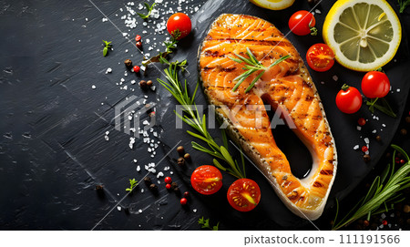 Delicious Grilled Steak and Salmon with Lemon on a Plate, a Gourmet Dinner Meal with Fresh Vegetables 111191566