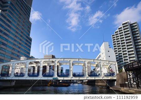 Water buses sailing in front of the Arch bridge Nov 27 2023 111192959