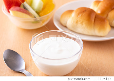 eat yogurt for breakfast 111193142