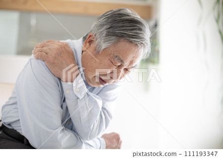 Japanese senior man suffering from stiff shoulders 111193347