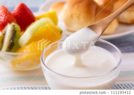 eat yogurt for breakfast 111193412