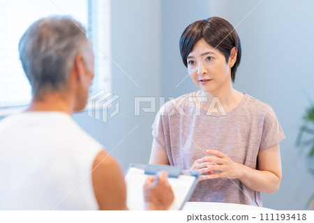 Middle-aged woman receiving counseling 111193418