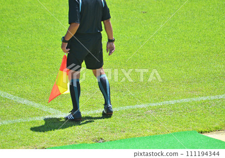 Youth soccer referee (assistant referee with flag) Youth soccer referee (assistant referee with flag) 111194344