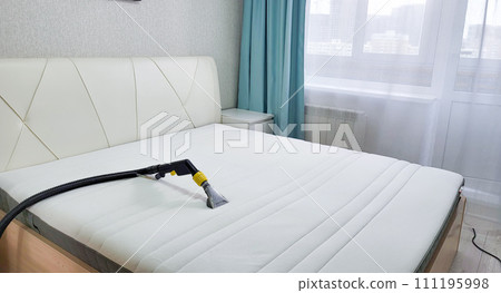 Mattress dry cleaning using a professional machine and chemicals. Dry cleaning at home. 111195998