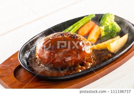 Bake a hamburger steak 111196737