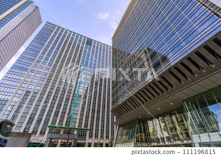 Tokyo cityscape in Japan View of Tokyo Station Nihonbashi exit (Buses carrying foreign tourists arrive one after another from Narita Airport) = 2nd Tokyo cityscape in Japan View of Tokyo Station Nihonbashi exit (Buses carrying foreign tourists arrive one after another from Narita Airport) = 2nd 111196815