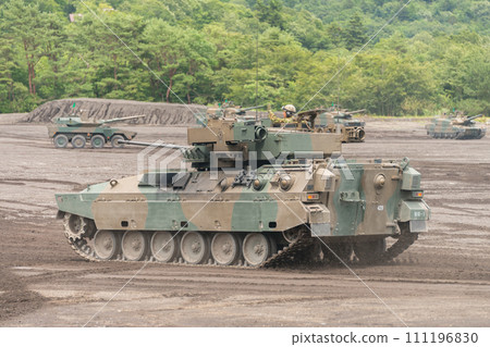 Ground Self-Defense Force Type 89 armored fighting vehicle running Ground Self-Defense Force Type 89 armored fighting vehicle running 111196830