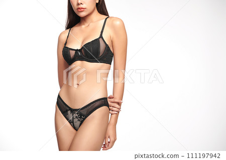 Confident beautiful young asian woman posing in black lingerie on white background, Perfect body, Confident beautiful young asian woman posing in black lingerie on white background, Perfect body, 111197942